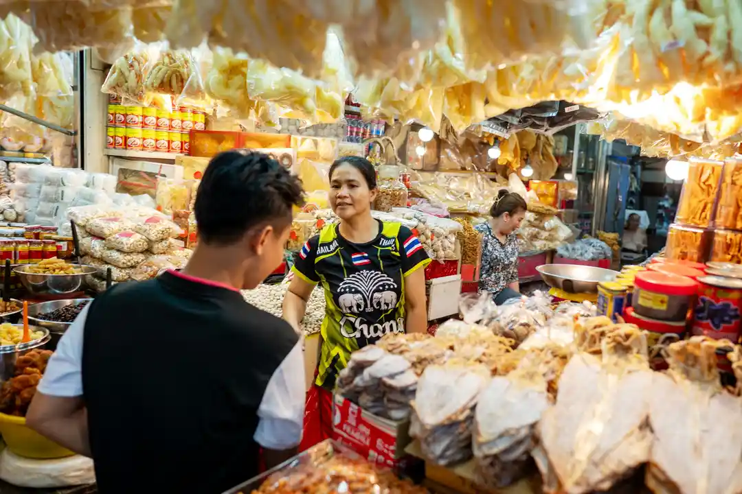 Yaowarat street life, neon signs, side streets, and dried goods shops