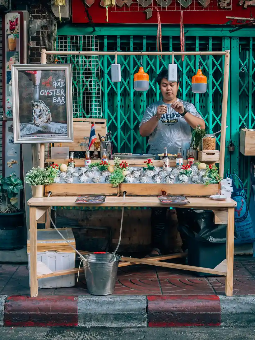 Street oyster stall, som tam papaya salad, and grilled pork photo 2