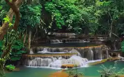 Tiered turquoise waterfall at Erawan National Park in Kanchanaburi