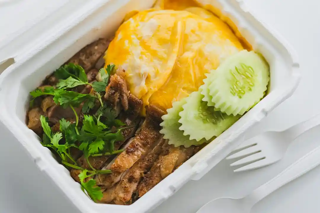 Khao moo daeng and massaman curry rice dishes