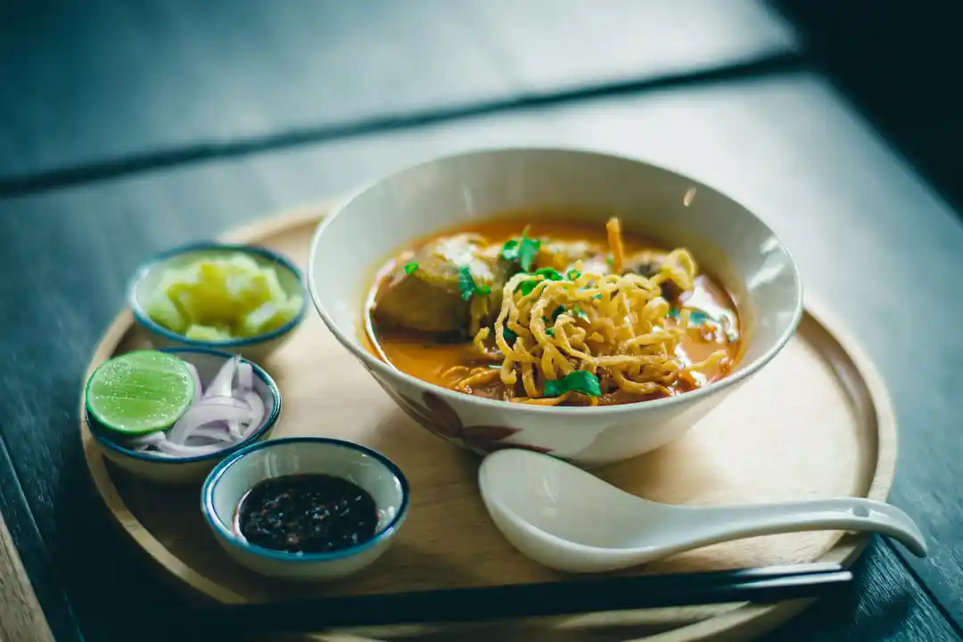 Khanom jeen, khao soi, and yum woon sen noodle dishes photo 2
