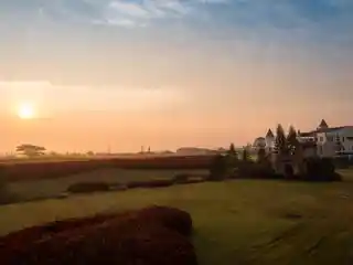 Warm sunrise over resort grounds in Khao Yai
