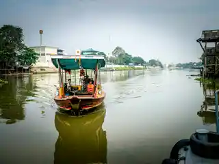 Boat on the river in Ayutthaya on a calm morning