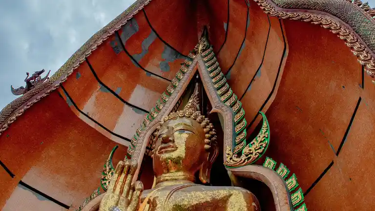 Large Buddha statue at Wat Tham Suea in Kanchanaburi